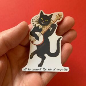 Off to Commit the Sin of Empathy Sticker with Vintage Cat Playing Music Anti-Fascist Stickers